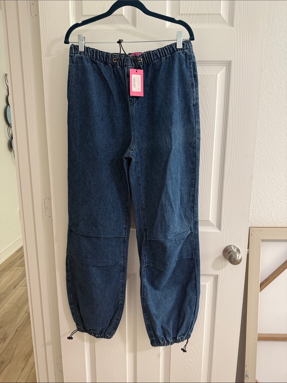 Edikted Pink Logo Tag on Dark Blue Denim